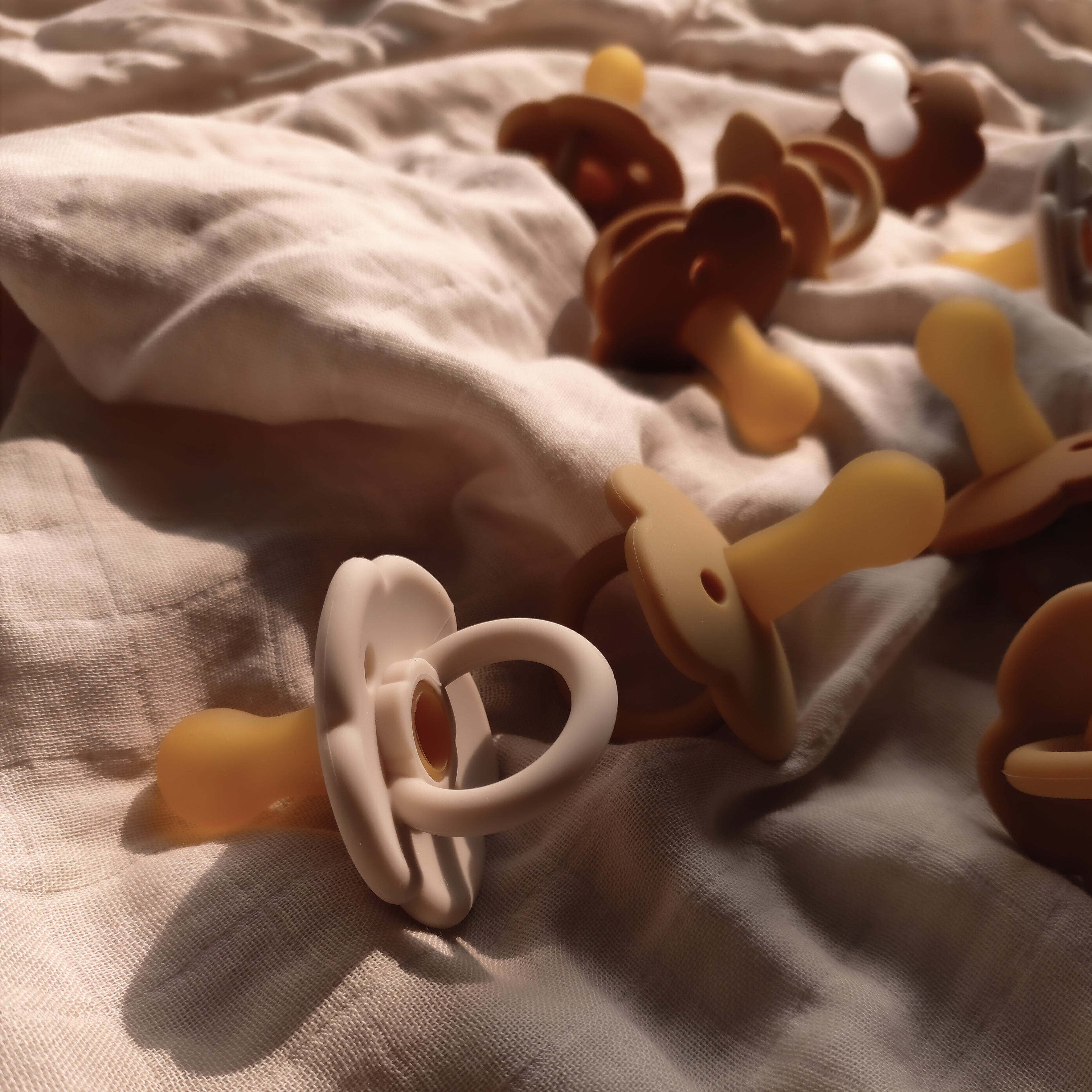 silicone Baby Pacifier On The Bed