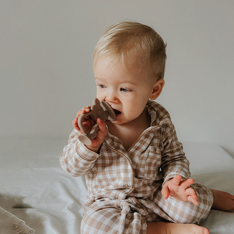 Baby Using Koala Teether Warmtaupe