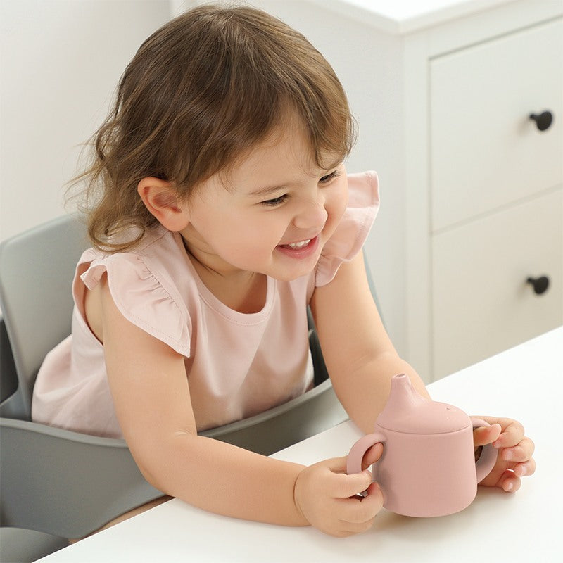 Baby Using Sippy Cup Blush