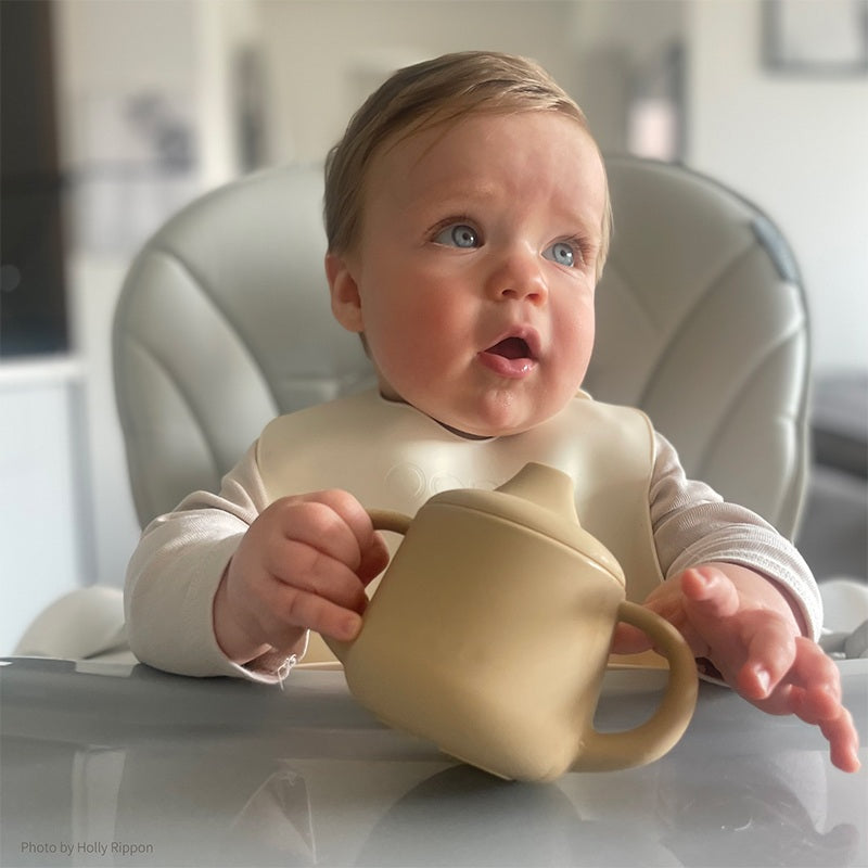 Baby Using Sippy Cup Croissant