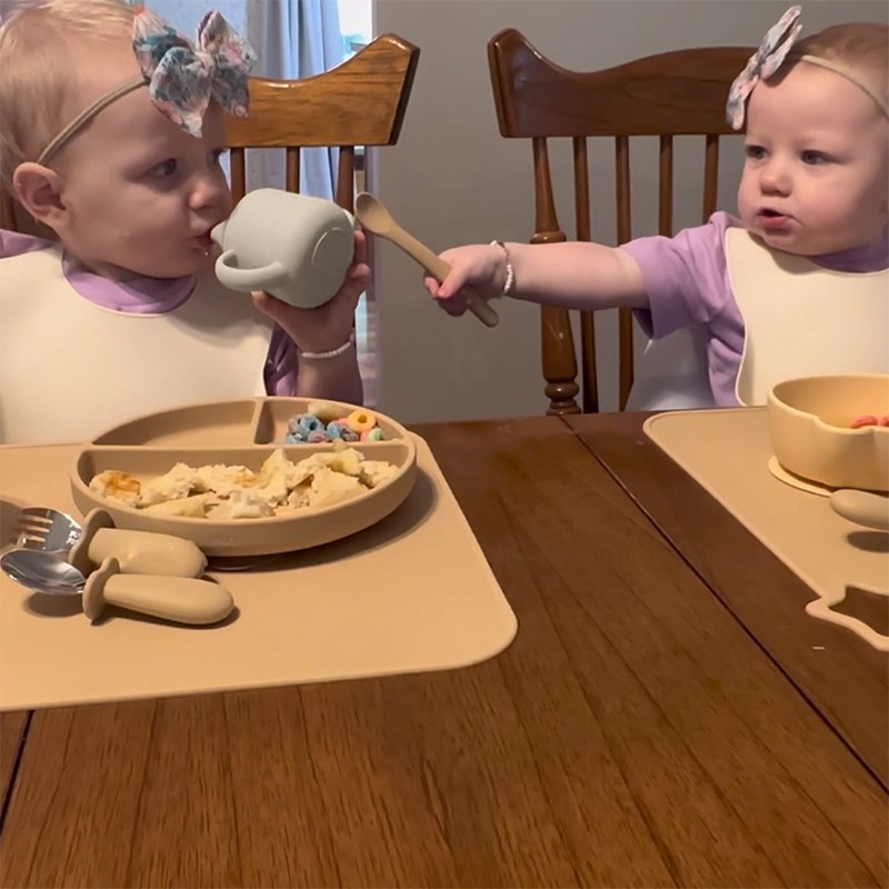 Baby Using Sippy Cup Ivory