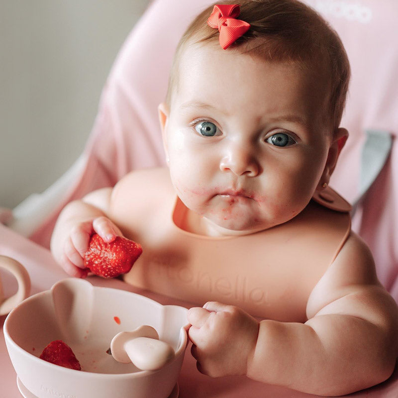 Baby Using Suction Bowl