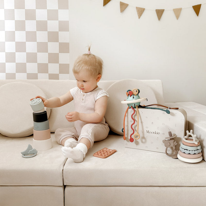 Baby Playing Stacking Cup From Set