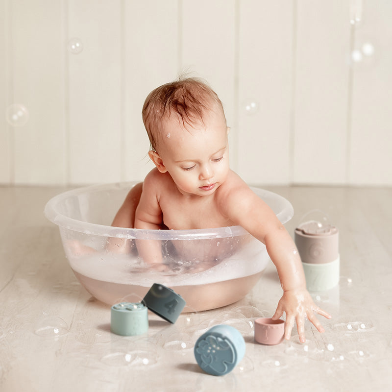 Baby Playing With Stacking Cups Fineday At Bathtime
