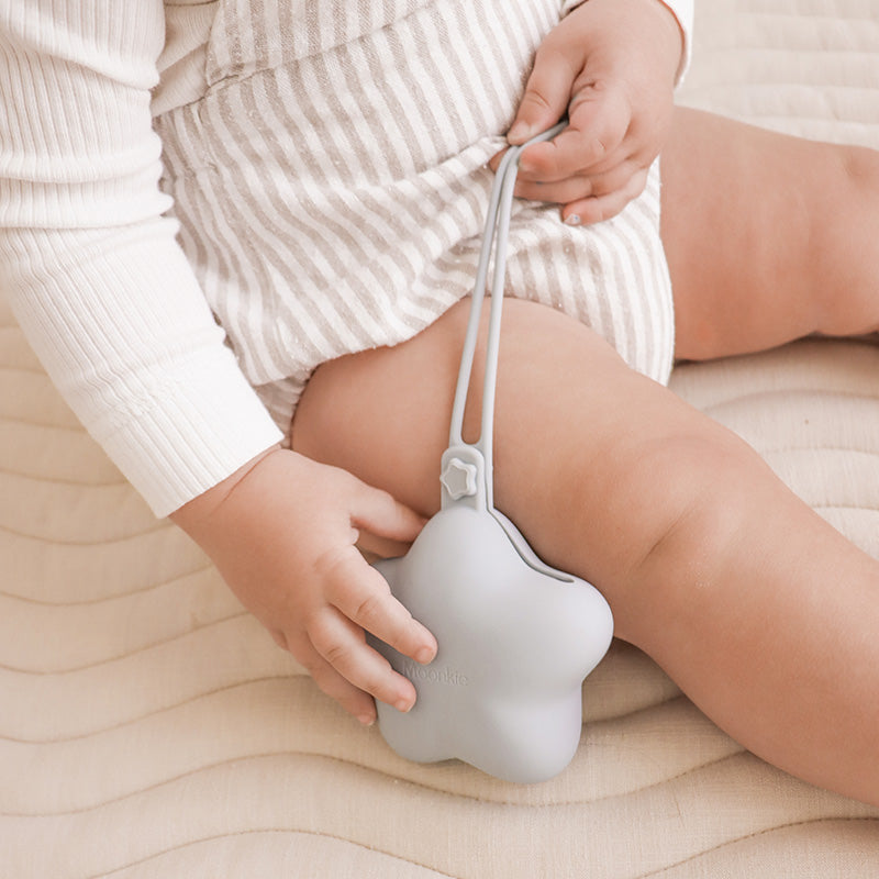 Baby Using Pacifier Holder