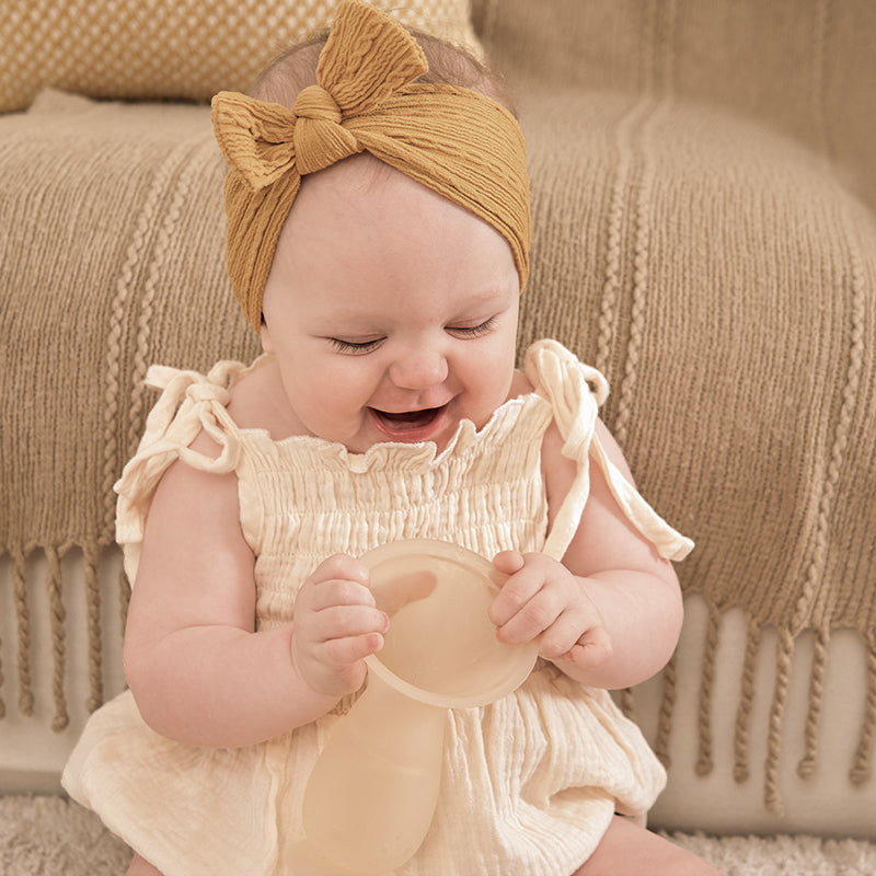 Baby With Breast Pumps