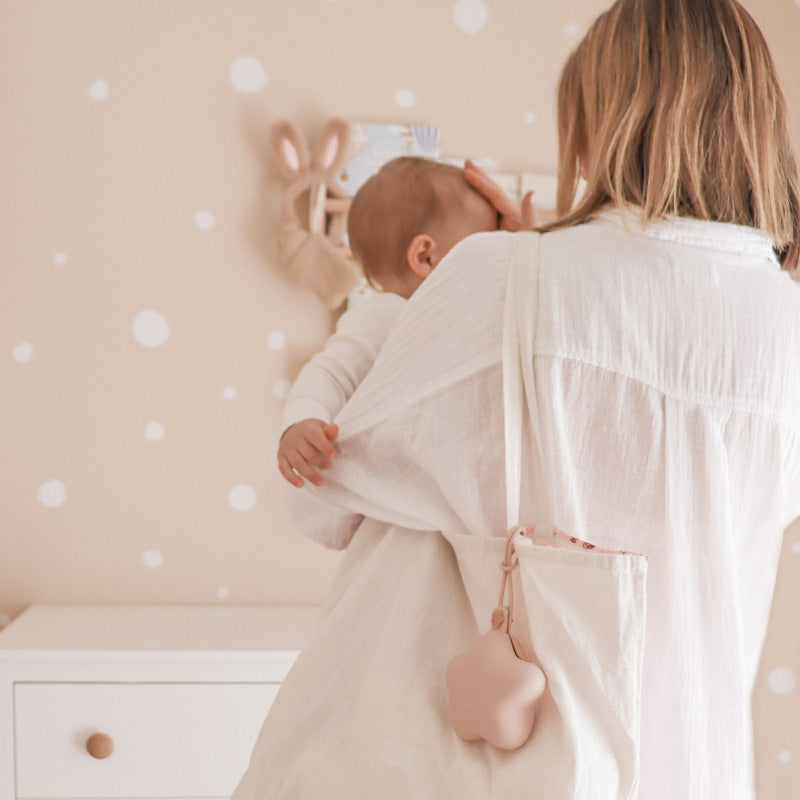 Mom Using Pacifier Holder